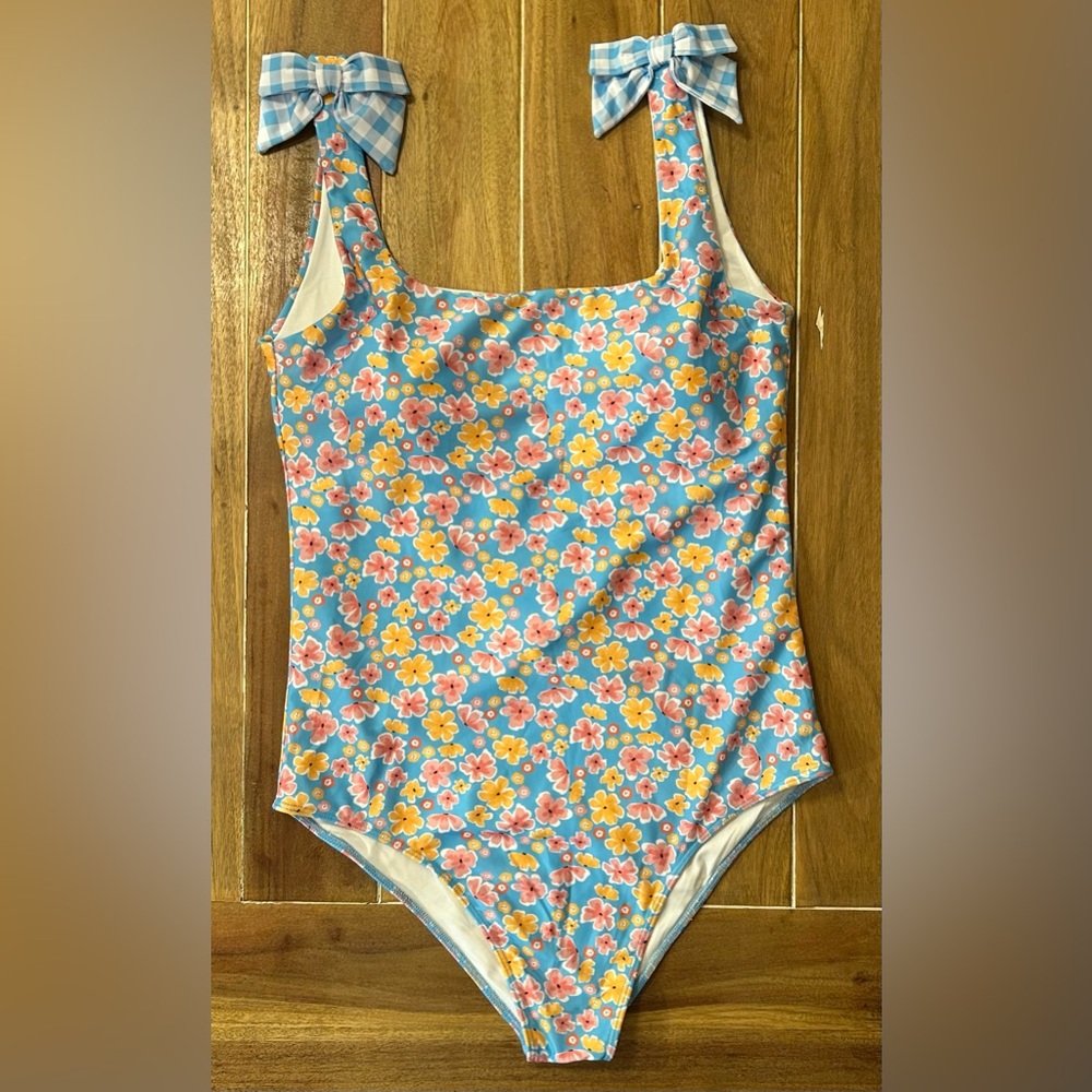 Floral Women’s one piece. Sew magnolia‎ size large.
